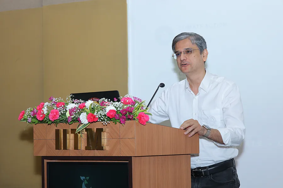 Addressing the conference from the podium on Day 1
