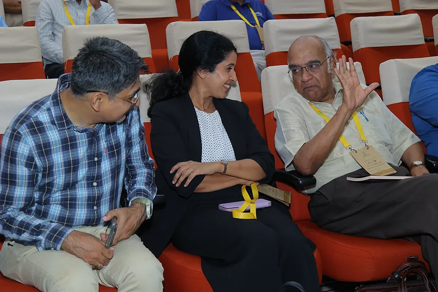 Delegates in discussion ahead of the morning session