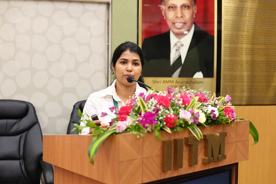 A research scholar presenting in the parallel session hall